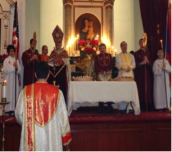 Archbishop Oshagan, Rev. Lakissian, deacons, Altar servers and Godfather of the Cross Mr. Ardashes Bedrosian during the Blessing of the Water ceremony