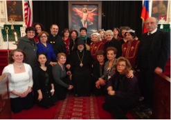 Archbishop Oshagan and Rev. Fr. Mesrob Lakissian with members  of the New York Mayr Chapter of the Armenian Relief Society.
