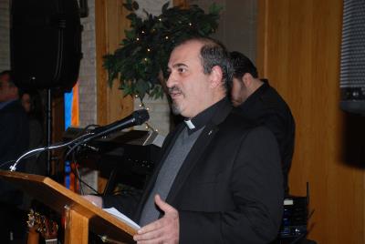 Rev. Mesrob Lakissian offering the Opening Prayer