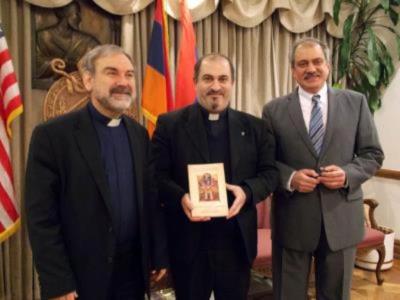 Bishop Anoushavan Tanielian presented the first copy of the Creed book to  Fr. Mesrob Lakissian. The book was sponsored by St. Illuminator's Cathedral.